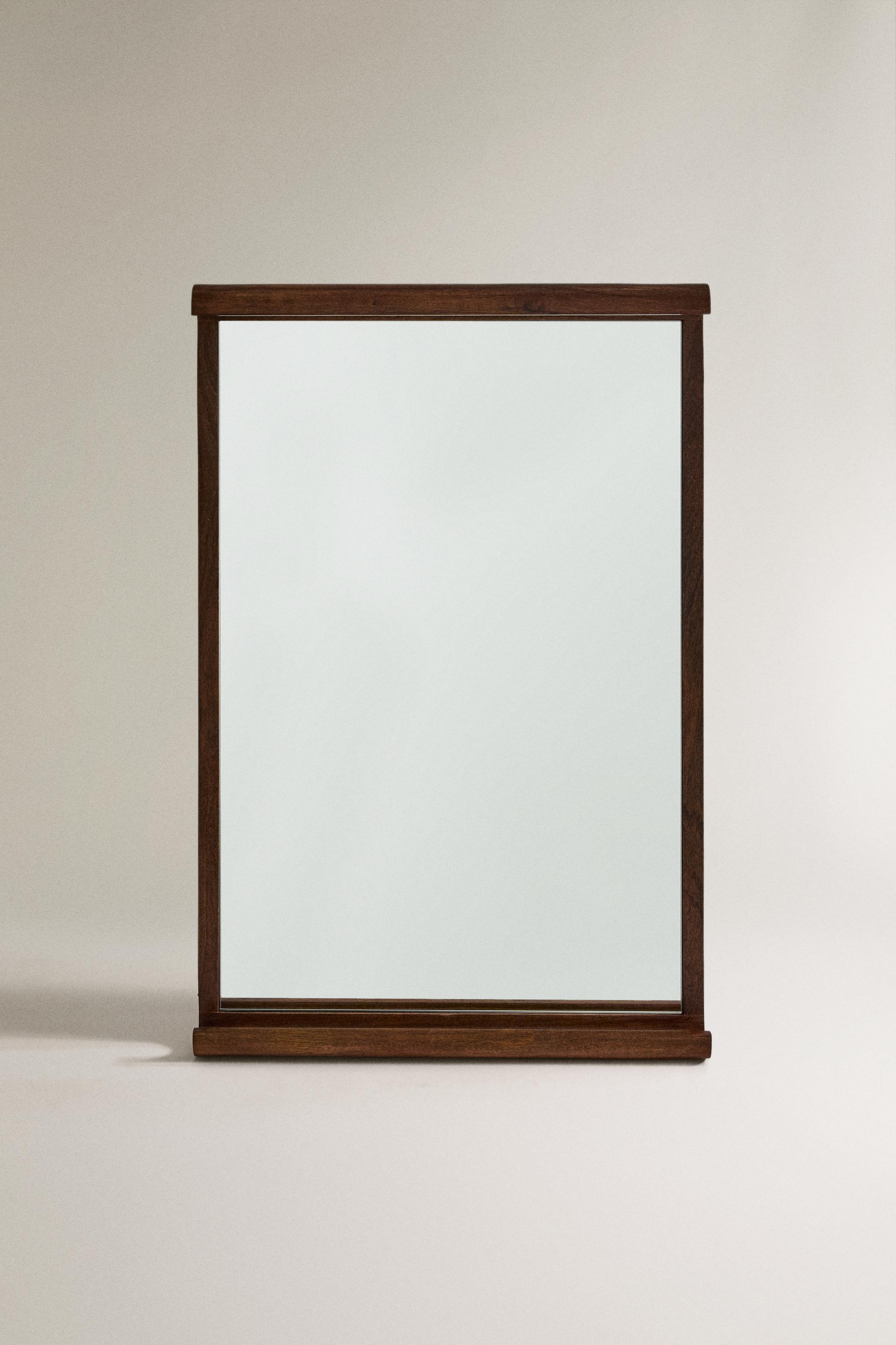 MIROIR MURAL CADRE COURBÉ